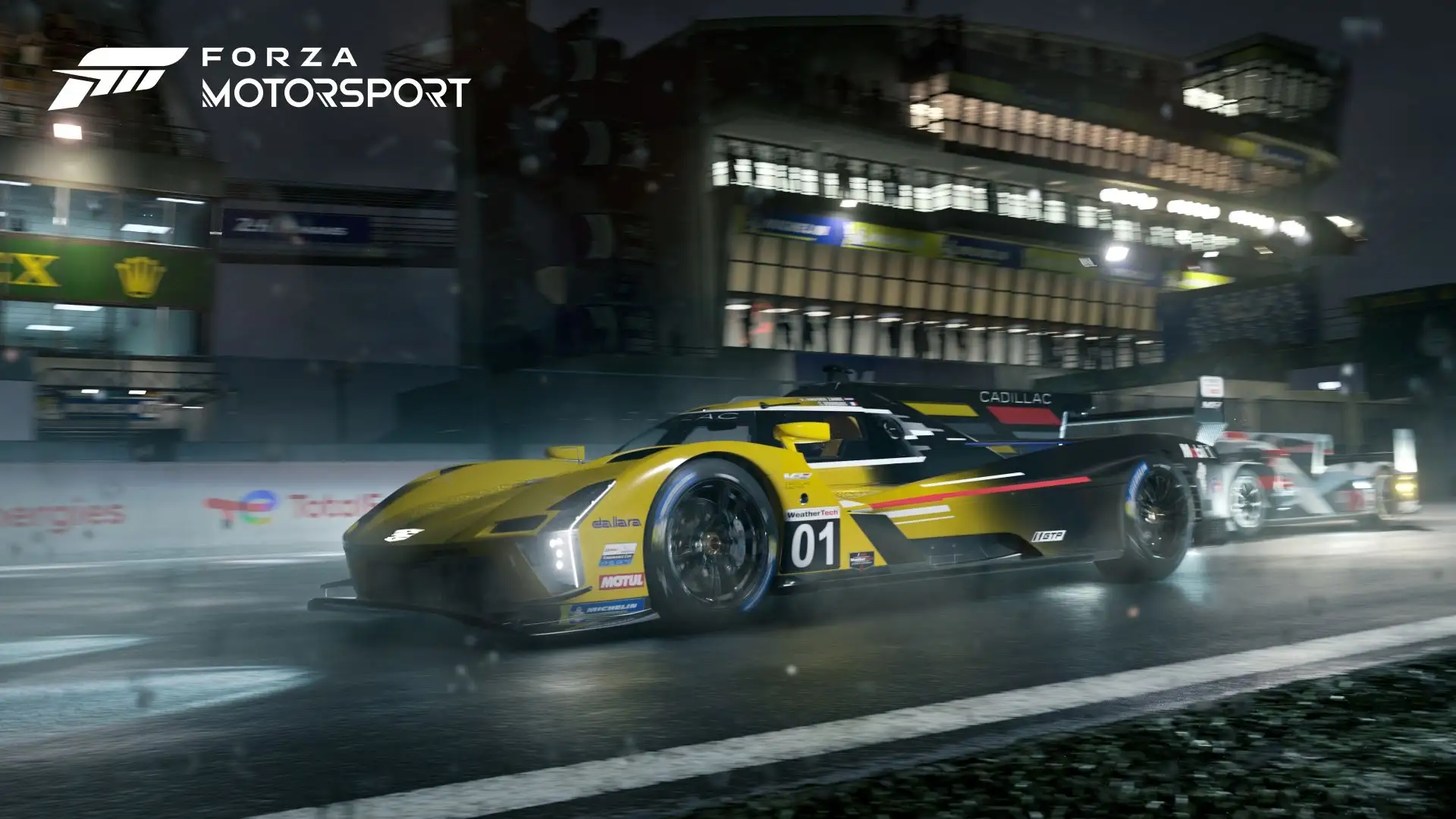 Cadillac Racing V-Series en pleine course de nuit sur Forza Motorsport sur Xbox Series X.