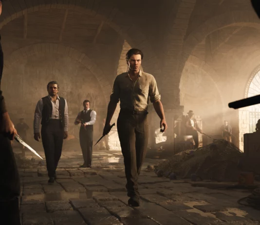 Mafia: The Old Country s’offre une mise à jour gratuite axée sur les courses et les défis Enzo Favara marchant armé dans une tonnara sicilienne dans Mafia The Old Country