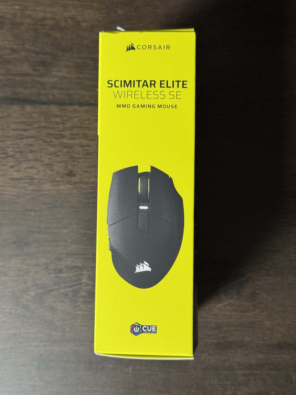 Profil latéral de la boîte Corsair Scimitar Elite Wireless SE, version jaune et noire