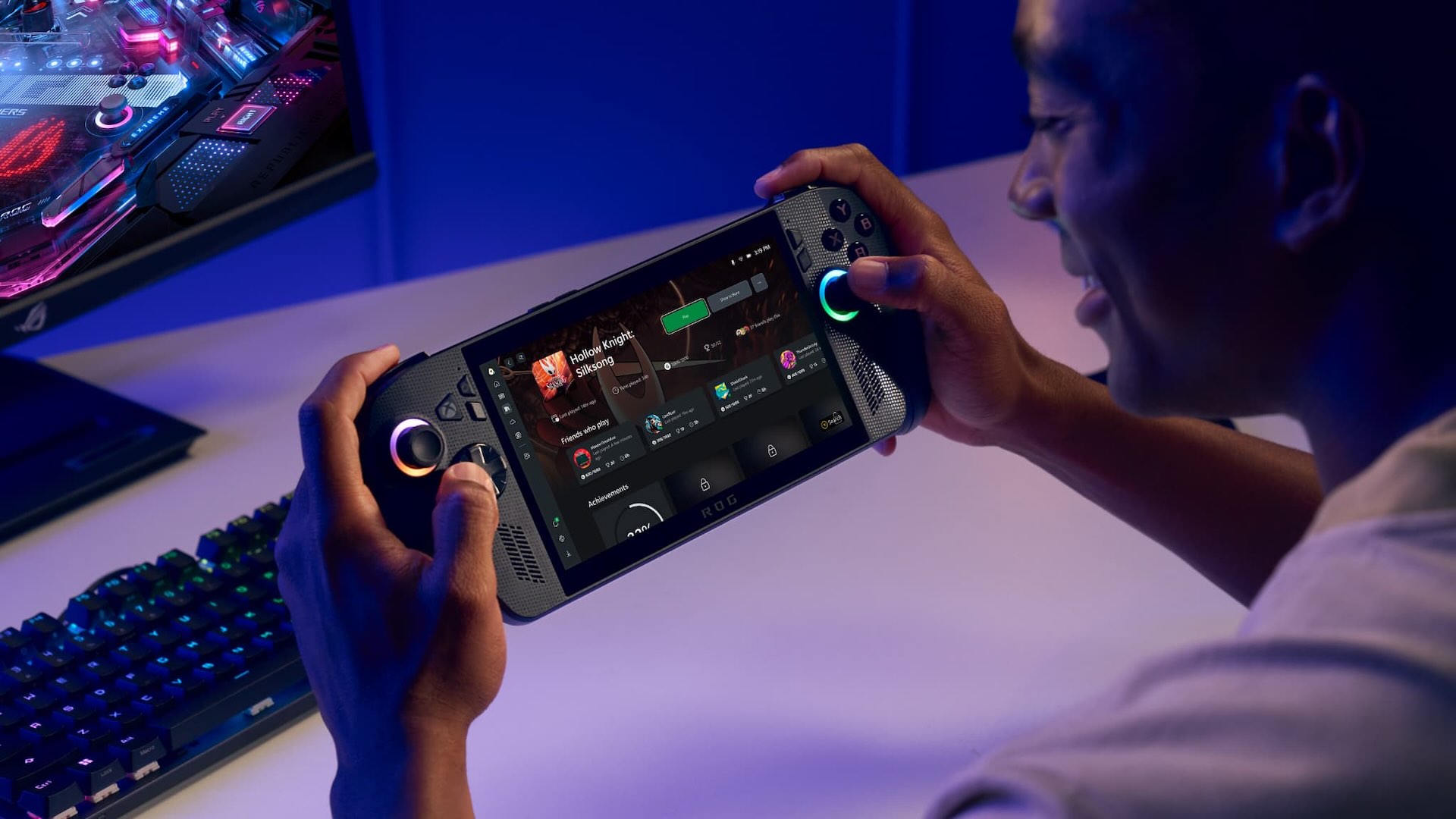 Joueur utilisant la console portable ROG Xbox Ally X en interface Xbox