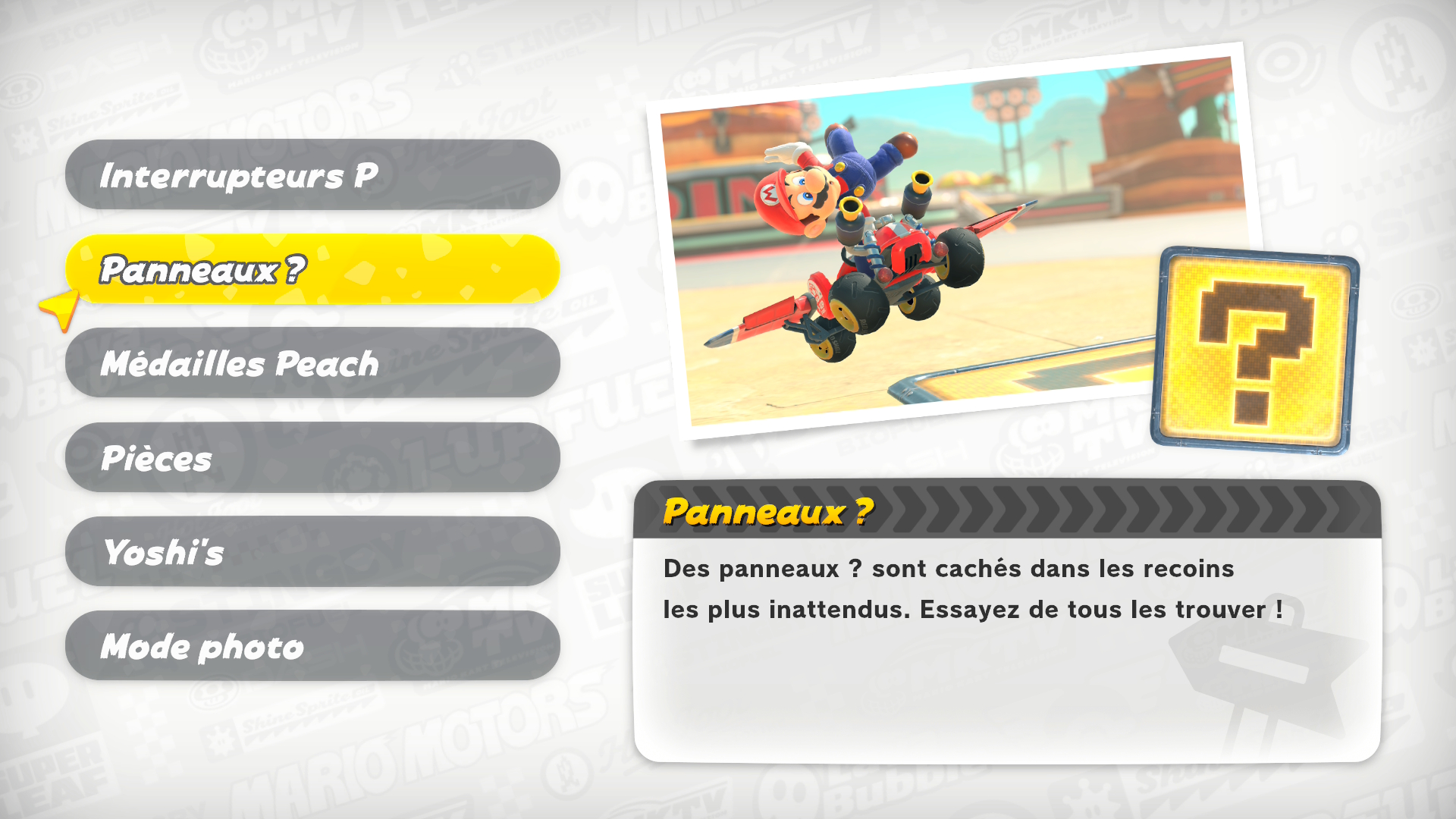 Menu de Mario Kart World affichant la section Panneaux ? avec Mario en kart