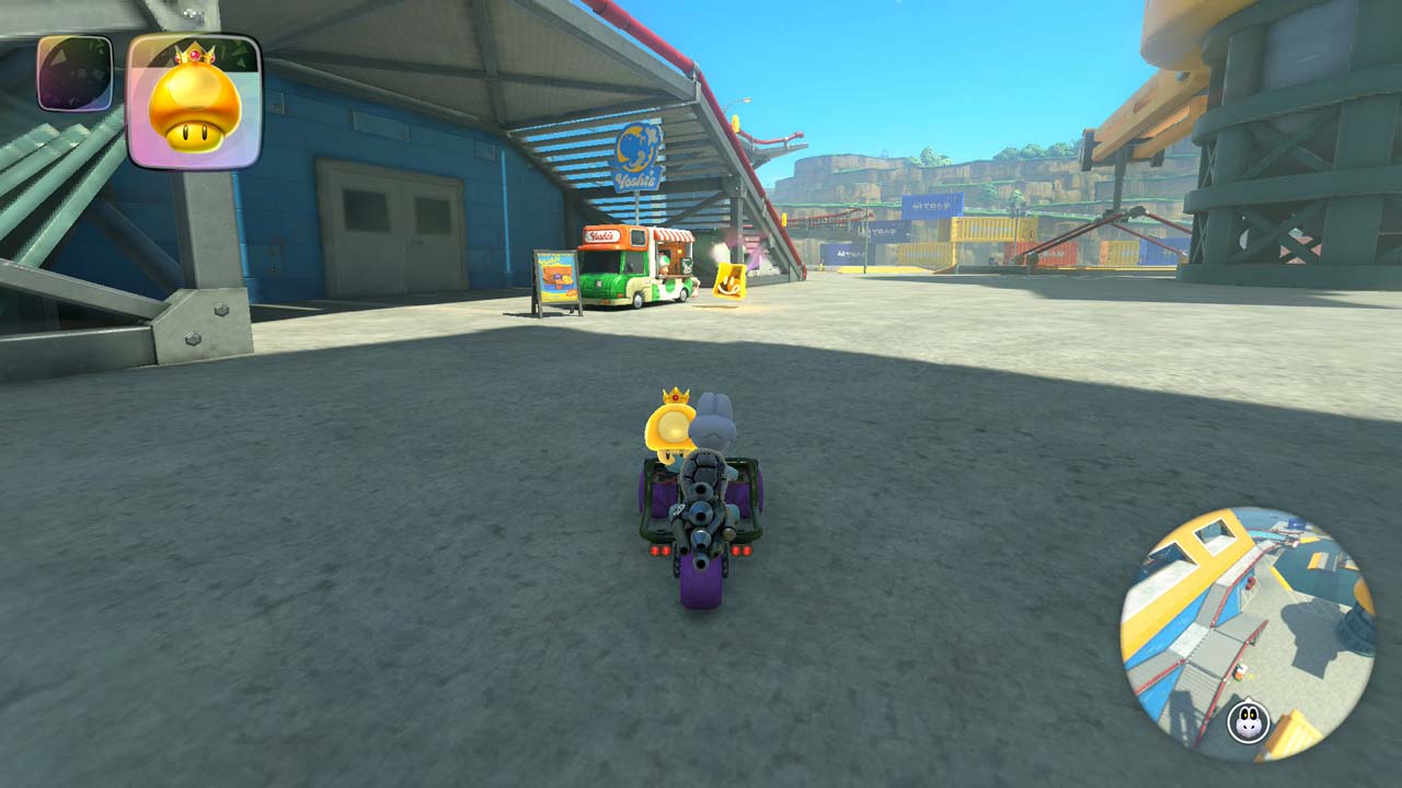 Exploration libre dans Mario Kart World devant un restaurant Yoshi's Diners