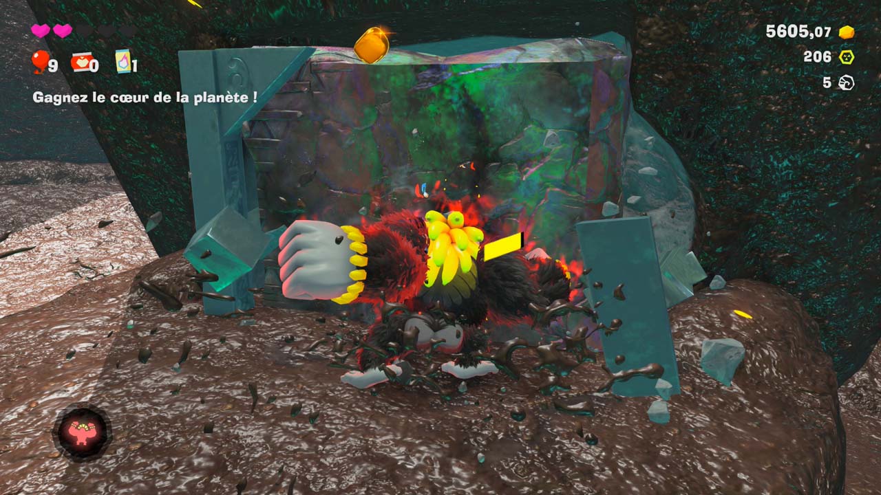  Transformation en Bananza Kong dans Donkey Kong Bananza détruisant un mur